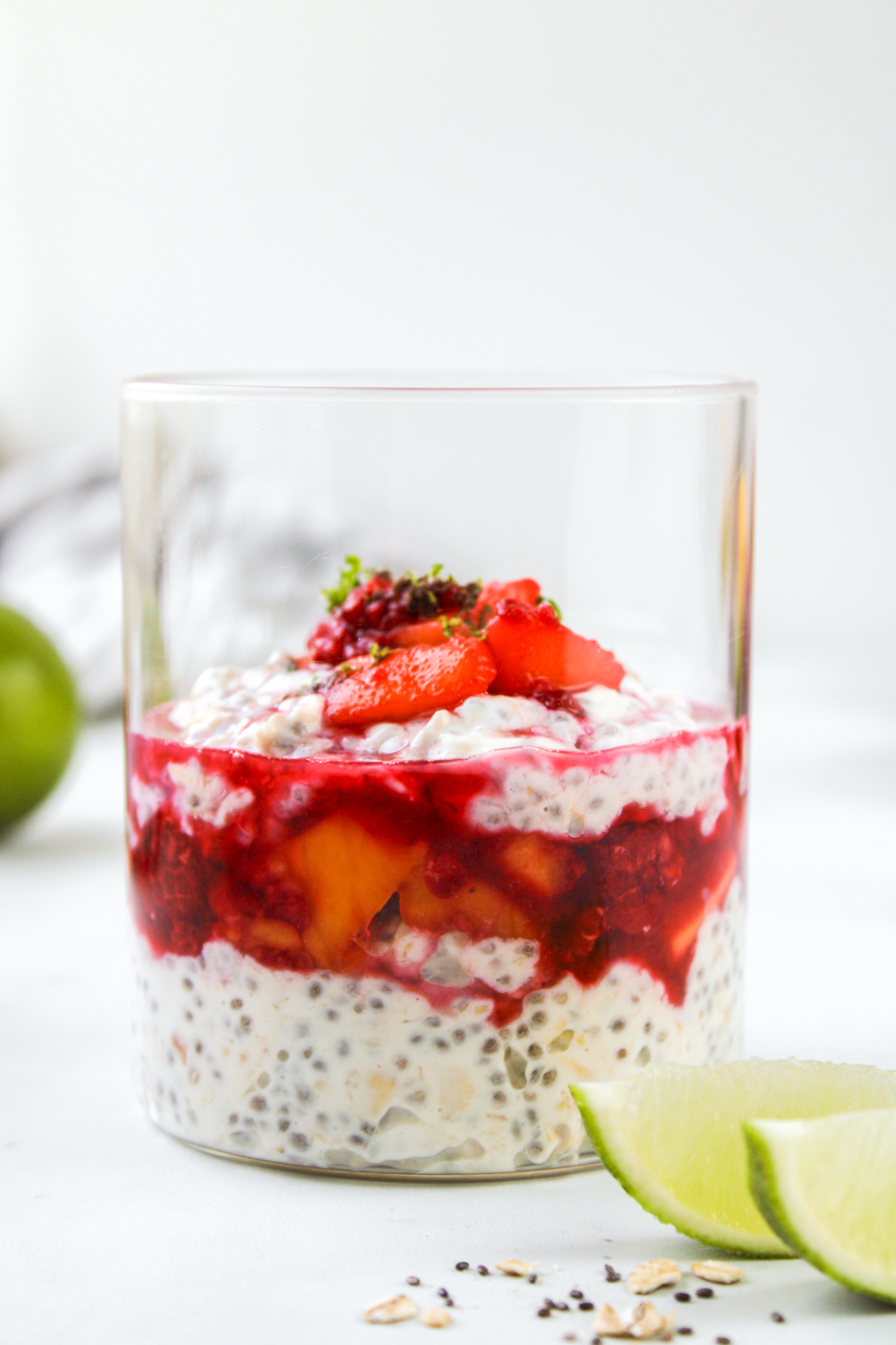 profile shot of mango overnight oats in a glass jar
