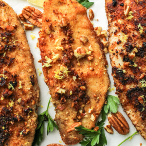 3 fillets of pecan crusted tilapia topped with chopped pecans, lemon zest and parsley