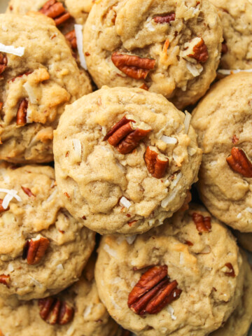 coconut pecan cookies layered on top of each other