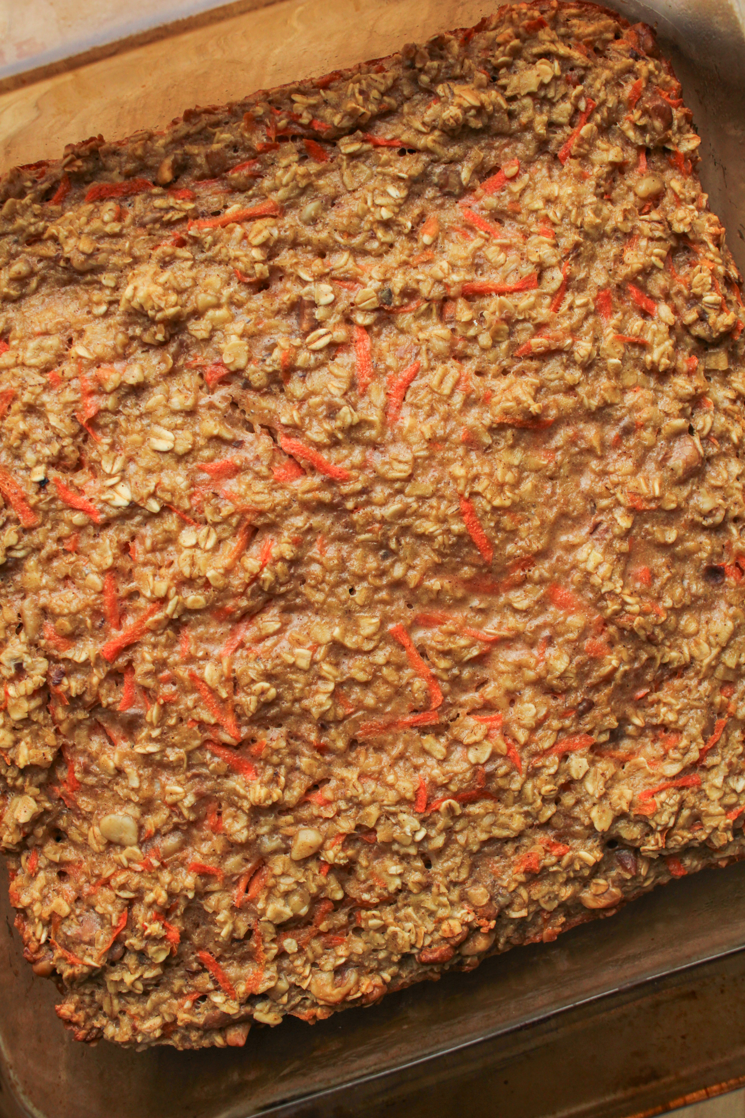 baked carrot oats in a brown 8x8" pyrex dish