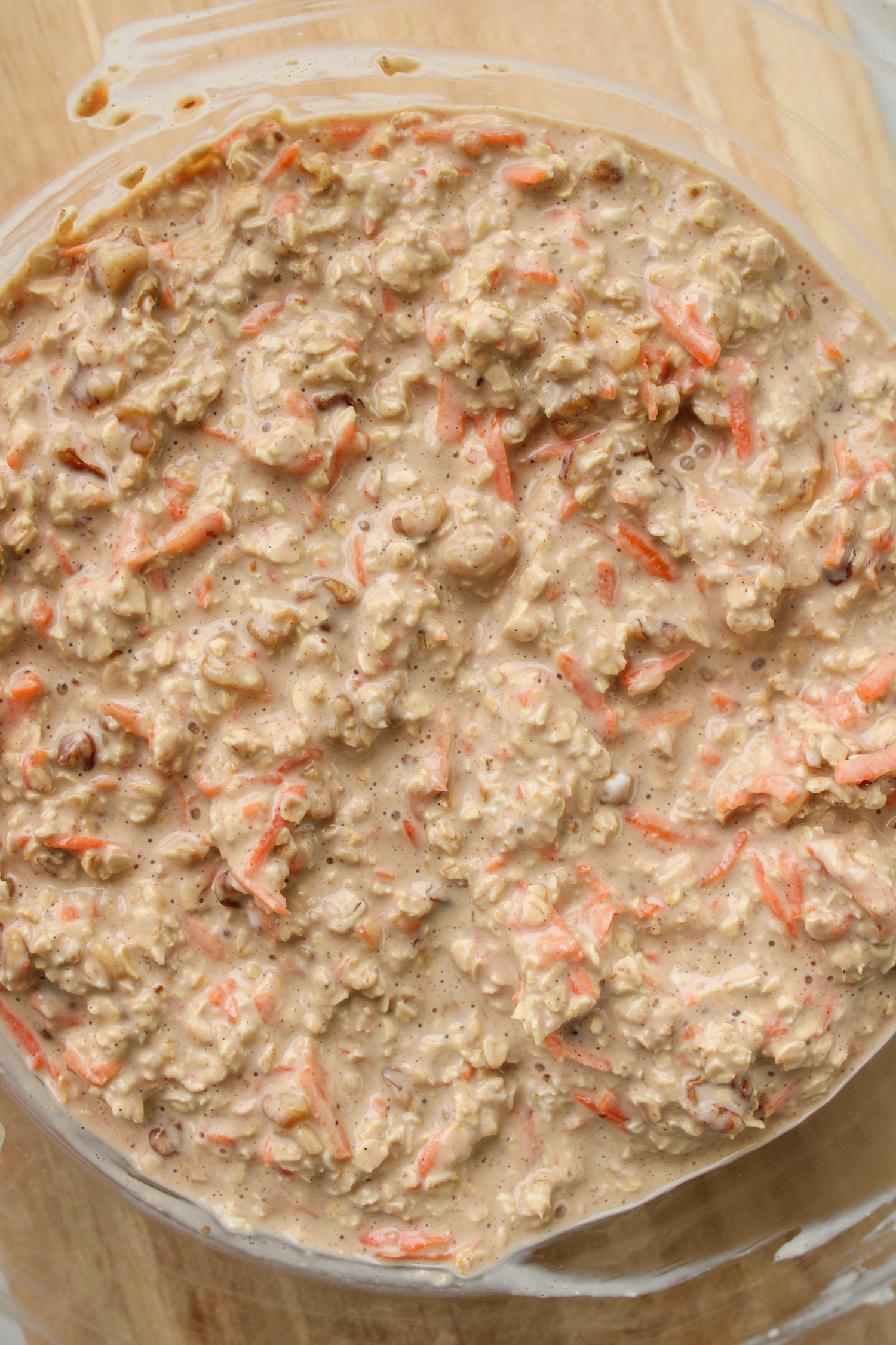 carrot oatmeal batter in a large glass bowl