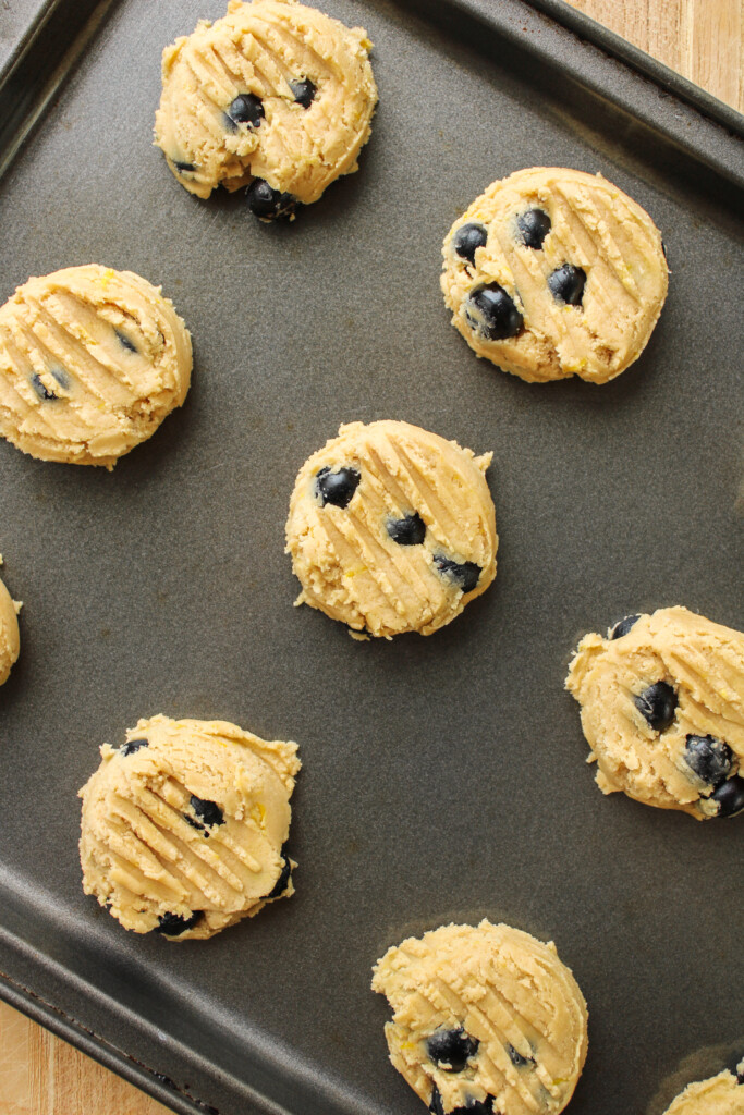 raw cookies on baking tray