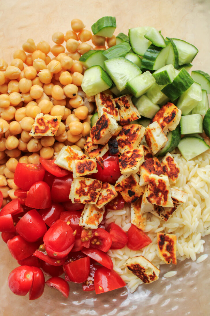 chickpea salad ingredients in a large bowl