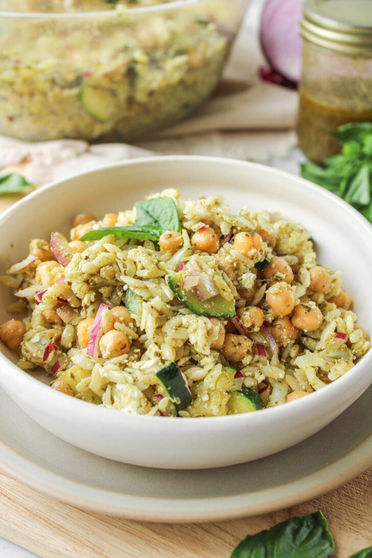 pasta salad with basil balsamic dressing drizzled on top