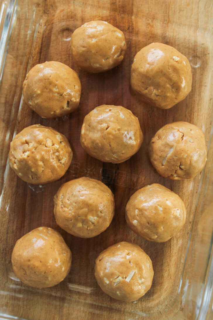 peanut butter protein balls in a glass container
